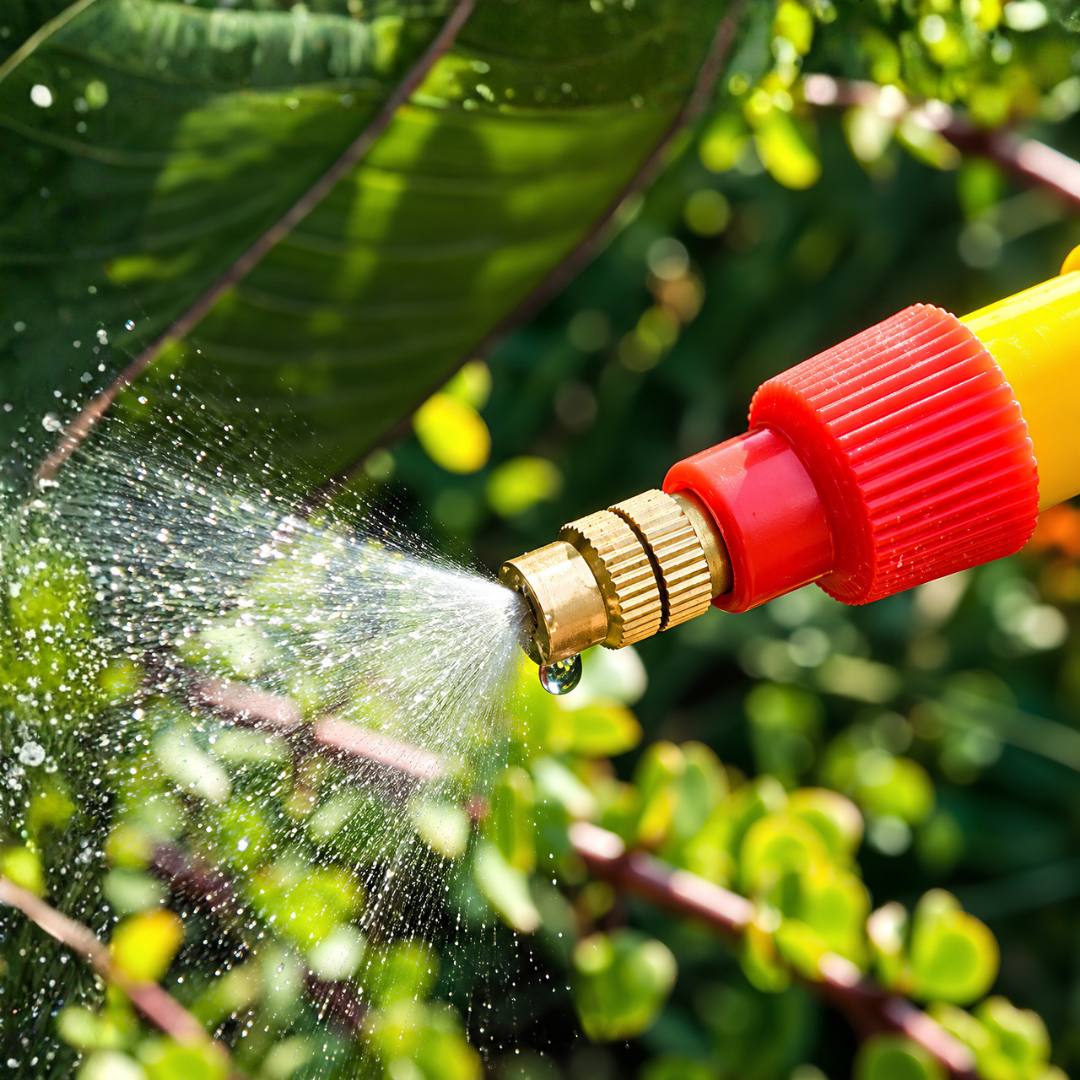 Bottle Pump Spray Gun with adjustable copper nozzle and manual pump-action pressure sprayer for watering plants, misting leaves and garden care. Reusable plastic bottle spray attachment designed for compatible 500ml and 2 Litre cold drink bottles, offering adjustable fine mist and larger water droplet spray settings.
