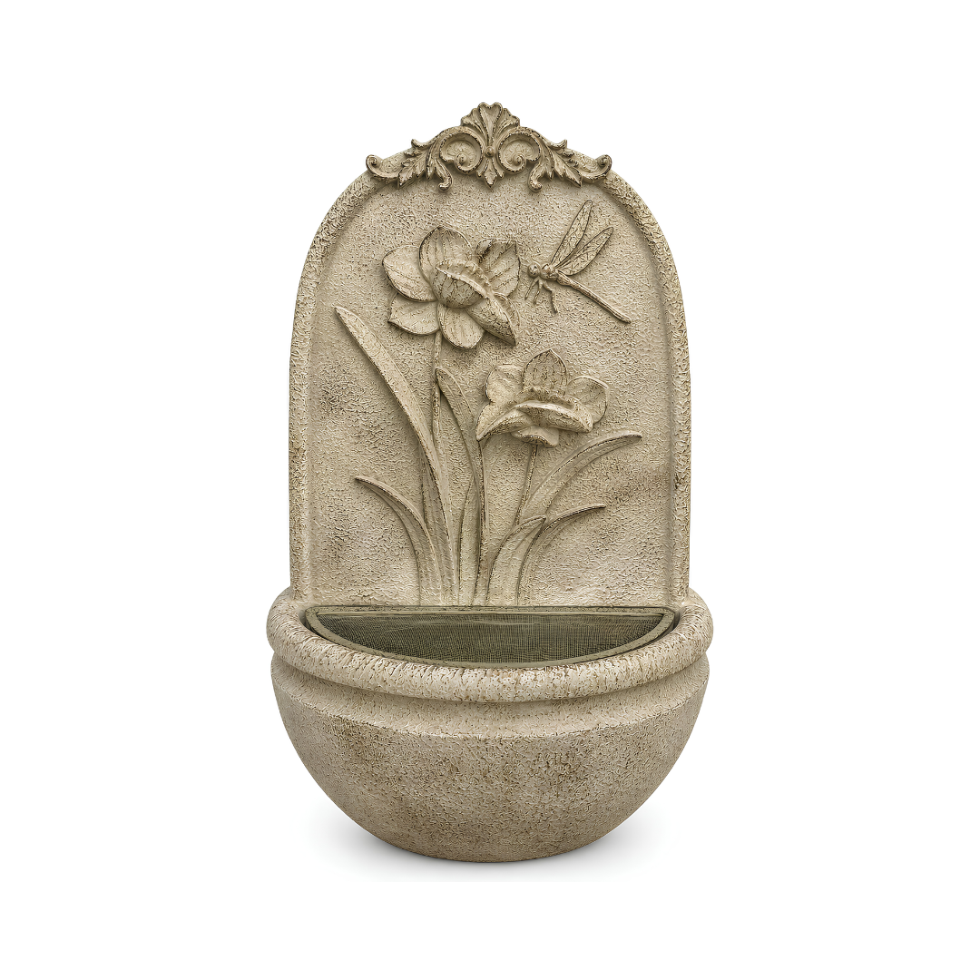 Floral wall mounted water feature with flower and dragonfly design, stone-look finish and rounded basin for indoor or outdoor use