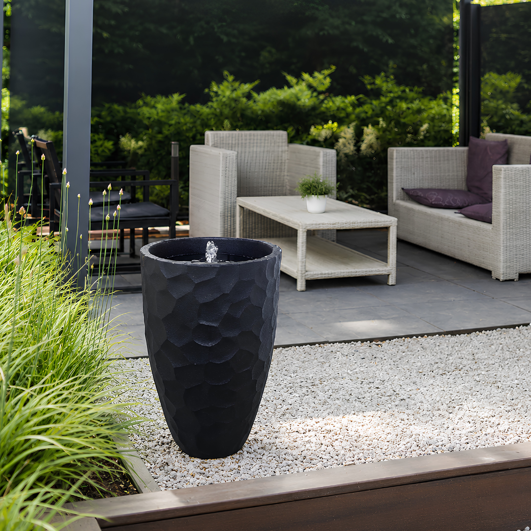 Molten Stone contemporary outdoor water feature for gardens, patios, courtyards and landscaped spaces