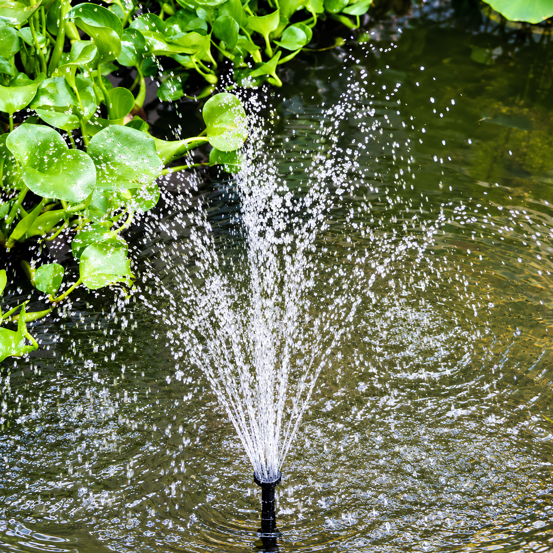 Waterhouse Solar Pond and Fountain Pump Kit 1400L/H with 25W solar panel, 18V 10W submersible fountain pump, two interchangeable fountain nozzles and extension pipes for garden ponds and outdoor water features.