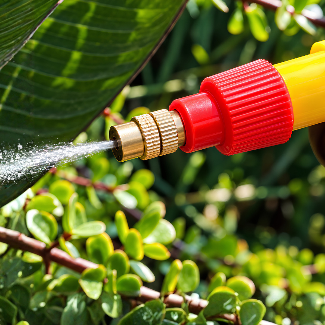 Bottle Pump Spray Gun with adjustable copper nozzle and manual pump-action pressure sprayer for watering plants, misting leaves and garden care. Reusable plastic bottle spray attachment designed for compatible 500ml and 2 Litre cold drink bottles, offering adjustable fine mist and larger water droplet spray settings.