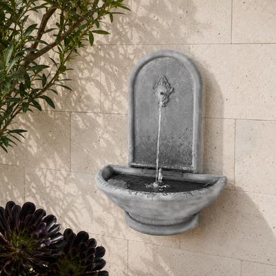 Classical lightweight cement wall-mounted water feature for gardens, patios, courtyards and outdoor decorative spaces