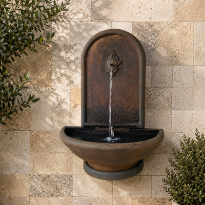 Classical lightweight rust wall-mounted water feature for gardens, patios, courtyards and outdoor decorative spaces