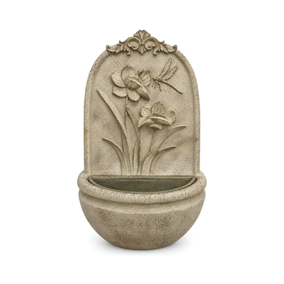 Floral wall mounted water feature with flower and dragonfly design, stone-look finish and rounded basin for indoor or outdoor use