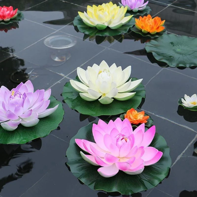 Artificial floating water lily set with small, medium and large lotus-style pond flowers for decorating ponds, pools and garden water features