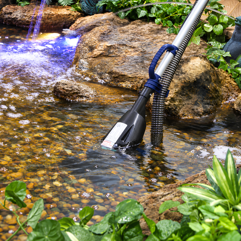 PC-1 Pond Vacuum Cleaner with 250W motor, 6000L/h flow rate, 2m telescopic pole, 6m discharge hose, remote control and two cleaning attachments for removing sludge and debris from garden and fish ponds.