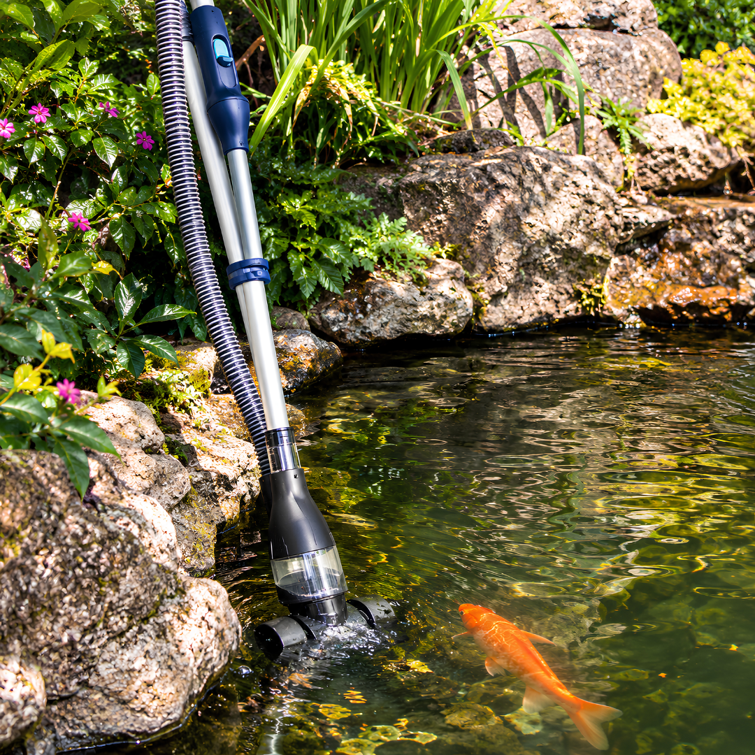PC-1 Pond Vacuum Cleaner with 250W motor, 6000L/h flow rate, 2m telescopic pole, 6m discharge hose, remote control and two cleaning attachments for removing sludge and debris from garden and fish ponds.