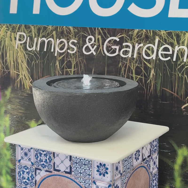 Modern Bowl Water Feature with round design, dark textured finish and central bubbling fountain for indoor or outdoor use