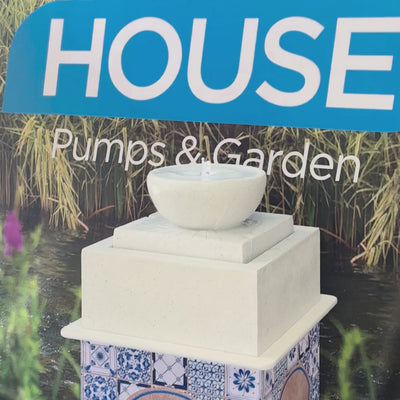 Modern Bowl Water Feature with Square Base, bubbling water, stone-look finish, ideal for indoor and outdoor spaces.